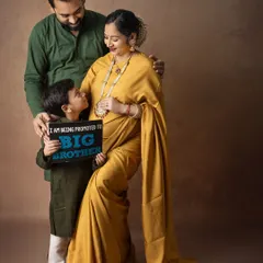 "I am being promoted to Big Brother!" This is such a sweet way to include the older sibling in the maternity announcement, capturing his excitement for the new arrival.