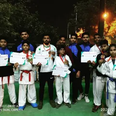 A group photo of my champions after a successful tournament. This picture captures the spirit of our academy: a supportive team that celebrates every victory, big or small, together.
