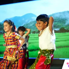 Joy is a core part of our curriculum. This moment from our Annual Day captures the pure happiness and confidence that blossoms on our stage. We believe that celebrating together through dance, music, and performance helps children express themselves and builds a strong, supportive community.