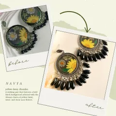 My Navya jhumkas, featuring yellow daisy and aster flowers, have been redesigned. I have updated the look to be more premium and elegant, with bolder black beads, while keeping the same price.