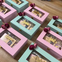 Asking your best friends to be your bridesmaids is a huge moment. I create these beautiful personalized proposal boxes in lovely pastel shades. Each box has a custom name cutout, a personal photo, and is filled with treats to show your girls how much they mean to you.