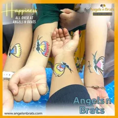 The finished product is always something to be proud of. Here are a few examples of the beautiful and colorful butterfly tattoos our artists painted on happy guests during one of our events.