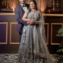 Glamour and elegance for the reception. Here, I created a sophisticated evening look for the couple, featuring a sparkling lehenga, soft wavy hair, and makeup that shines under the lights.