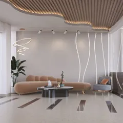 This lounge area uses a mix of curved and straight lines to create visual interest. The combination of a plush sofa, a structured armchair, and minimalist lighting results in a balanced and contemporary commercial space.