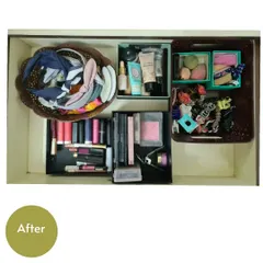 The "after" of the makeup drawer. By using small boxes and trays as dividers, we created specific compartments for lipsticks, palettes, and hair accessories.