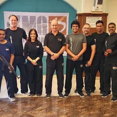 Our certified instructors undergoing an update course with Master Eyal Yanilov, focusing on advanced weapon defenses, including handgun and long-gun threats.