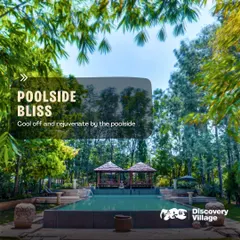 Find your poolside bliss at our Kanakapura resort, where you can cool off and rejuvenate surrounded by lush trees.