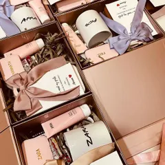 Asking your friends to be your bridesmaids is a special moment. We put together these personalized proposal boxes, each with a custom mug, beauty products, and other goodies, all tied together with beautiful ribbons in different pastel shades.