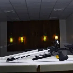 A close-up of a modern Hammerli competition air rifle, highlighting the professional-grade equipment available for use at my academy.