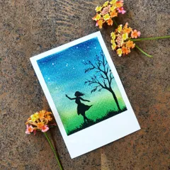 A polaroid-style watercolor painting of a girl's silhouette against a starry night sky. I find that creating small art like this is very comforting and gives a quick sense of accomplishment.