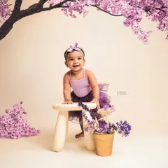 And here is the magic! We took the original photo and used AI to add a stunning cherry blossom tree, transforming a simple portrait into a work of art.