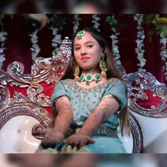 A photo from my own mehendi ceremony. It was such a joy to be the bride and be adorned with beautiful henna.