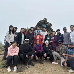 A large group photo at the Kumaraparvatha peak, showing the diverse mix of people who join my treks.
