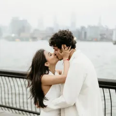 A love story sealed with a kiss, with the city as their witness. After the big surprise, we take a few moments for a mini-session. No awkward posing, just you two soaking it all in. This is about capturing that electrifying chemistry.