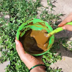 This is where the magic begins. I personally mix my own henna paste using all-natural, organic ingredients to get this smooth, silky consistency, which is key for fine lines and a great stain.