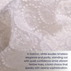 In fashion, white exudes timeless elegance and purity. This close-up shows the delicate tone-on-tone embroidery that gives the fabric a serene sophistication.