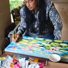 Here I am, lost in the process of a live painting session at the ITC Gardenia hotel. This is where the magic happens, bringing a canvas to life with layers of color and emotion, one brushstroke at a time.