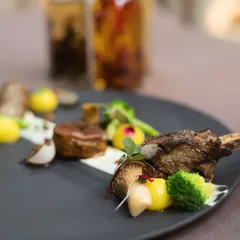 The Duo of Lamb is a showcase of textures and flavors, featuring different cuts of lamb prepared to perfection.