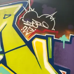 A detail of my 'ZERO 23' tag on a piece. Tagging is the foundation of graffiti culture, and it's a signature I leave on all my work, big or small.