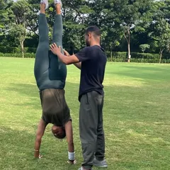Leveling up my skills game by practicing unsupported handstands. My shoulders are shot, but the progress is worth it.