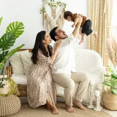 The pure joy of parenthood. Photos like this, full of laughter and love, are the perfect moments to turn into a family keepsake that will make you smile every time you see it.