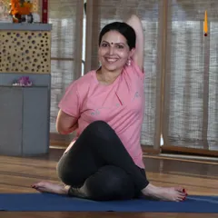 I demonstrate Gomukhasana (Cow Face Pose), a deep shoulder and hip opener. The practice is about creating space in the muscles and skin so the body can fit into the asana with intelligence.