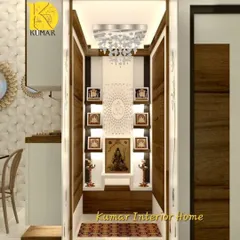 A dedicated pooja room designed for tranquility and elegance. This space features rich wood paneling, backlit shelves for idols, a stunning chandelier, and a CNC-cut 'Om' panel.
