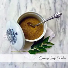 My Curry Leaf Podi is both healthy and delicious, presented here in a traditional ceramic jar. I use fresh curry leaves and lentils to create this aromatic, protein-rich powder that has a wonderful, earthy fragrance.