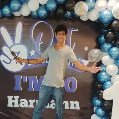 Mic in hand, ready to rock the stage. I bring my full 'Baazigar' energy to every event I host.