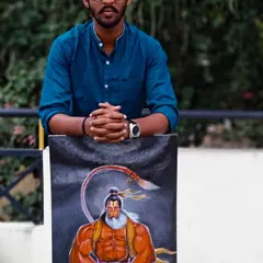 Standing with my completed Hanuman painting. This piece was a labor of love, and I'm proud of how the acrylic colors capture both the strength and calmness of the deity.