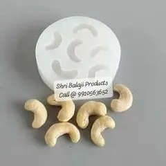 Add a gourmet touch to your creations with this cashew-shaped silicone mold. It's perfect for making unique chocolates, soap embeds, or even wax melts.