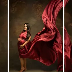Art in motion. This studio shot uses a dramatic sweep of red fabric to create a stunning visual effect, framing the mother-to-be in a beautiful, artistic composition.