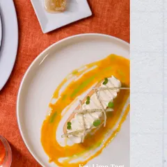 Our artfully presented Key Lime Tart. This dessert is a perfect balance of sweet and tangy, with a creamy filling and delicate garnishes that make it a true work of art.
