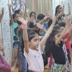 Arms up and smiles on. Our dance sessions are designed to be engaging and build confidence, with every child encouraged to participate and express themselves through movement.