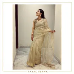 A client looking classic and elegant in a gold tissue saree paired with a pure Banarasi silk blouse. This photo was taken during a fitting at my studio.