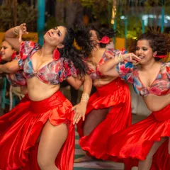 Nothing beats the adrenaline of performing on stage with my amazing ladies team. This shot captures the power, expression, and pure joy of our Salsa routine.
