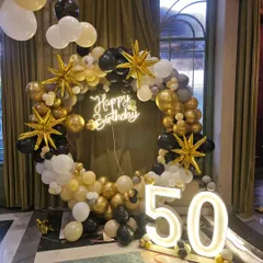 A full view of the sophisticated 50th birthday ring setup, perfect for capturing memorable photos of the big milestone.