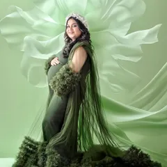 A creative edit using the green gown, with a digital floral effect that seems to bloom from the dress itself. This is an example of the fine art editing I offer.