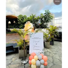 I design custom welcome boards to match the theme of your event. This simple, elegant sign greeted guests at an outdoor engagement party, setting the tone from the moment they arrived.
