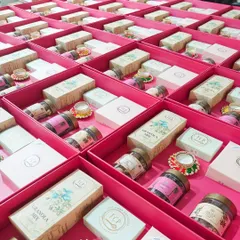 This is a familiar sight in our studio during the festive season. Rows of vibrant boxes being prepared for a large corporate Diwali order, each one checked for quality.