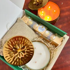 Our festive hampers are perfect for spreading joy. This popular Diwali gift box includes one of our beautiful metal urli candles, Ferrero Rocher chocolates, and premium dry fruits, all packed beautifully.