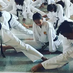 Flexibility and conditioning are crucial. Our black belt candidates go through rigorous stretching exercises as part of their grading exam to demonstrate their physical preparedness.