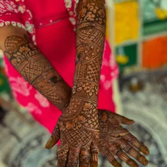 A full view of the traditional design, showcasing the rich patterns covering both arms.