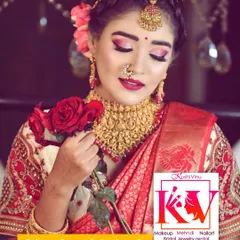 The work of one of my talented students from a recent batch. This classic bridal look features soft pink eyeshadow, a bold red lip, and traditional gold jewellery.