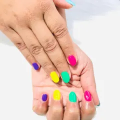 Another look at the fun, multi-colored "skittles" manicure.