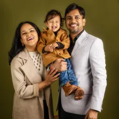 This is what it's all about: pure, uninhibited family joy. I love creating a space where you can forget the camera and just be yourselves, resulting in portraits filled with laughter.