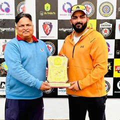 Receiving the winner's plaque for the Bhagwan Parshuram tournament. Recognition for the hard work the entire team and coaching staff put in.