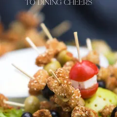 These sesame-crusted chicken skewers are a crowd favorite. Paired with olives and cherry tomatoes, they are a perfect bite-sized snack for any corporate party or social gathering.