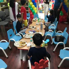 A view of the kids' dining area during Krishav's party. The children have their own space to sit together and enjoy the birthday feast.
