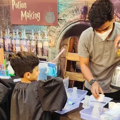 Welcome to potions class. In our Wizard World theme, every little wizard gets to mix and brew their own bubbling, color-changing concoctions, learning basic chemistry in the most magical way possible.